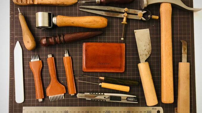 a variety of tools laid out on a cutting board